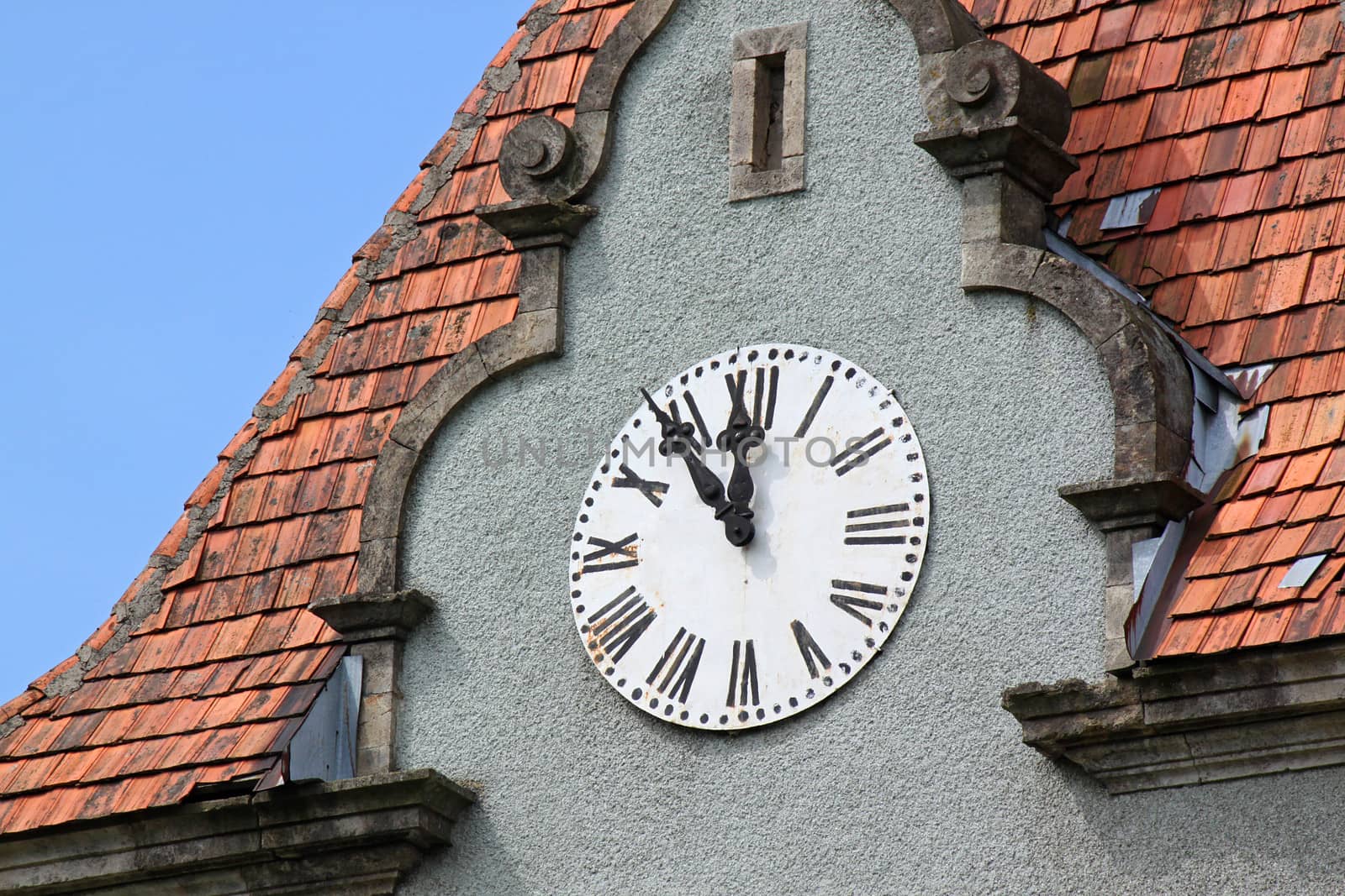 clock on tower of palace near Chynadiyovo, Ukraine