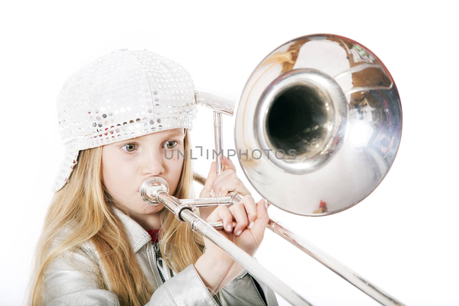 young girl with cap playing trombone by ahavelaar