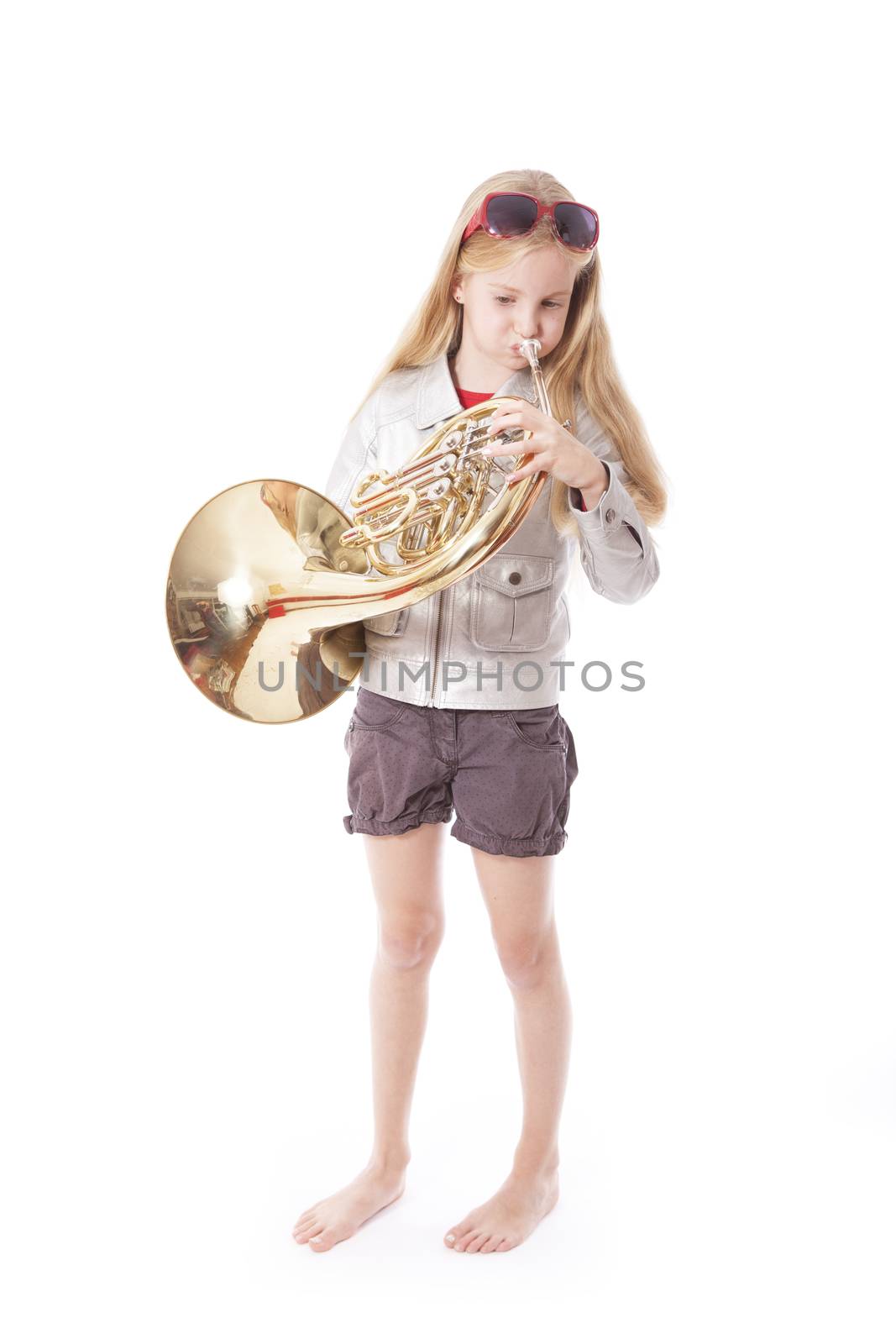 young girl playing french horn by ahavelaar