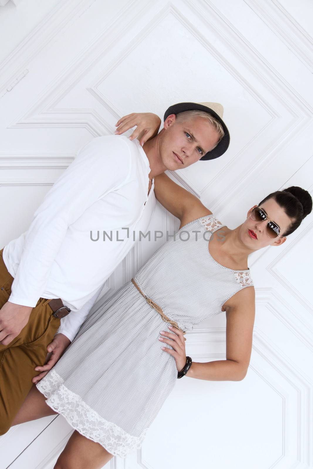 attractive young couple in casual fashion outdoor in summer portrait lifestyle