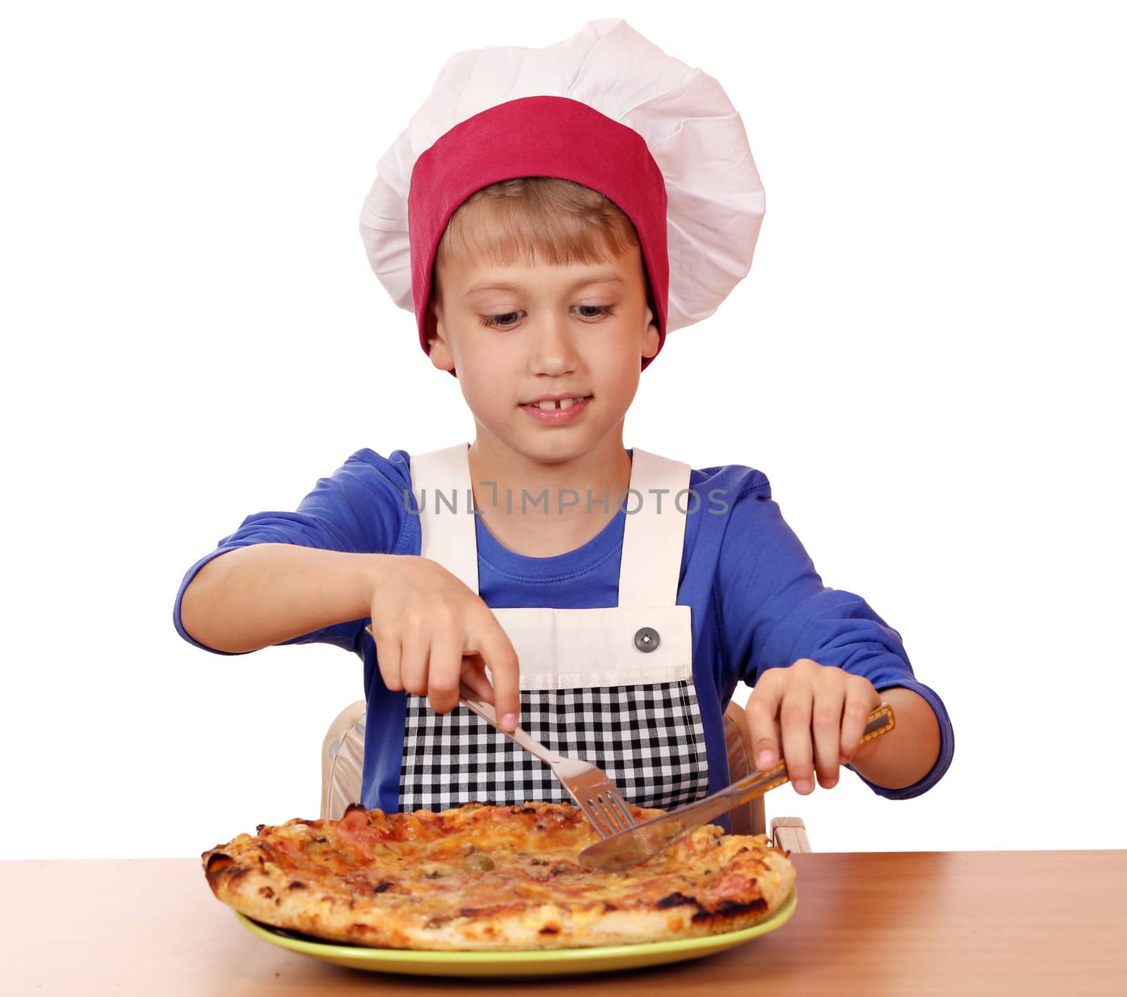 hungry boy chef eat pizza