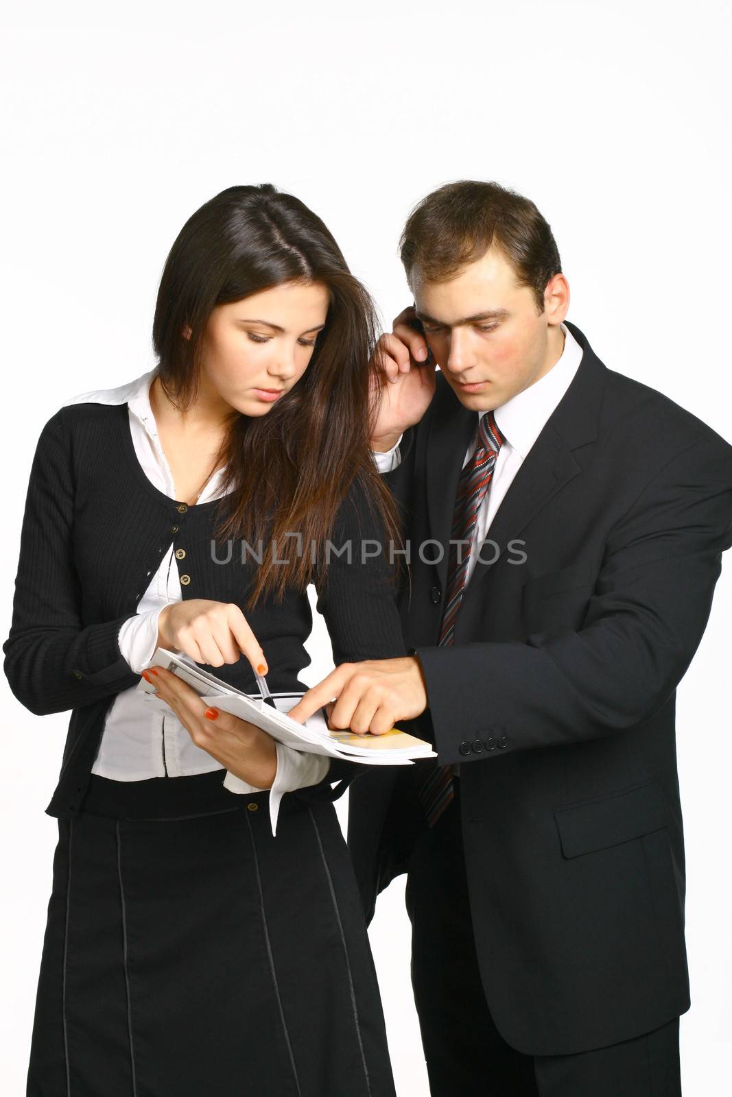 The chief dictates something to the secretary and it writes down