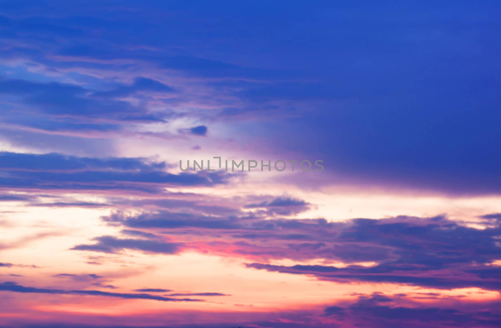 Bright orange and blue colors sunset sky.