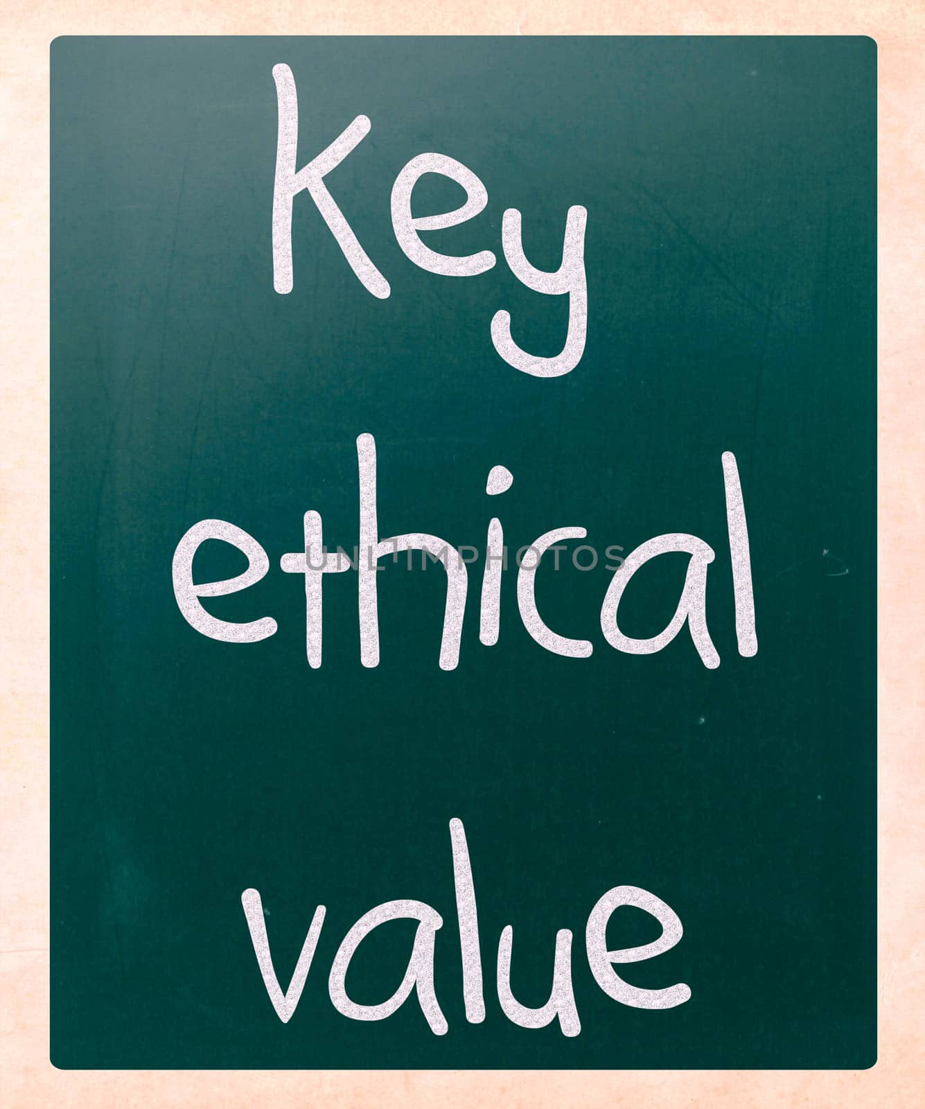 "key ethical value" handwritten with white chalk on a blackboard