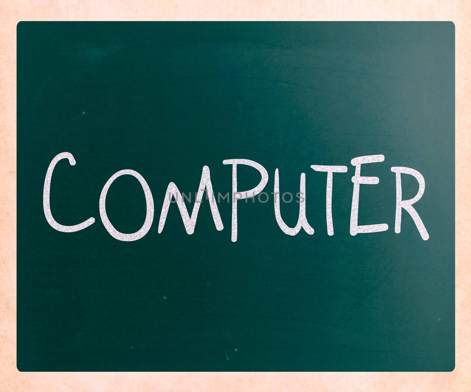 "Computer" handwritten with white chalk on a blackboard by nenov