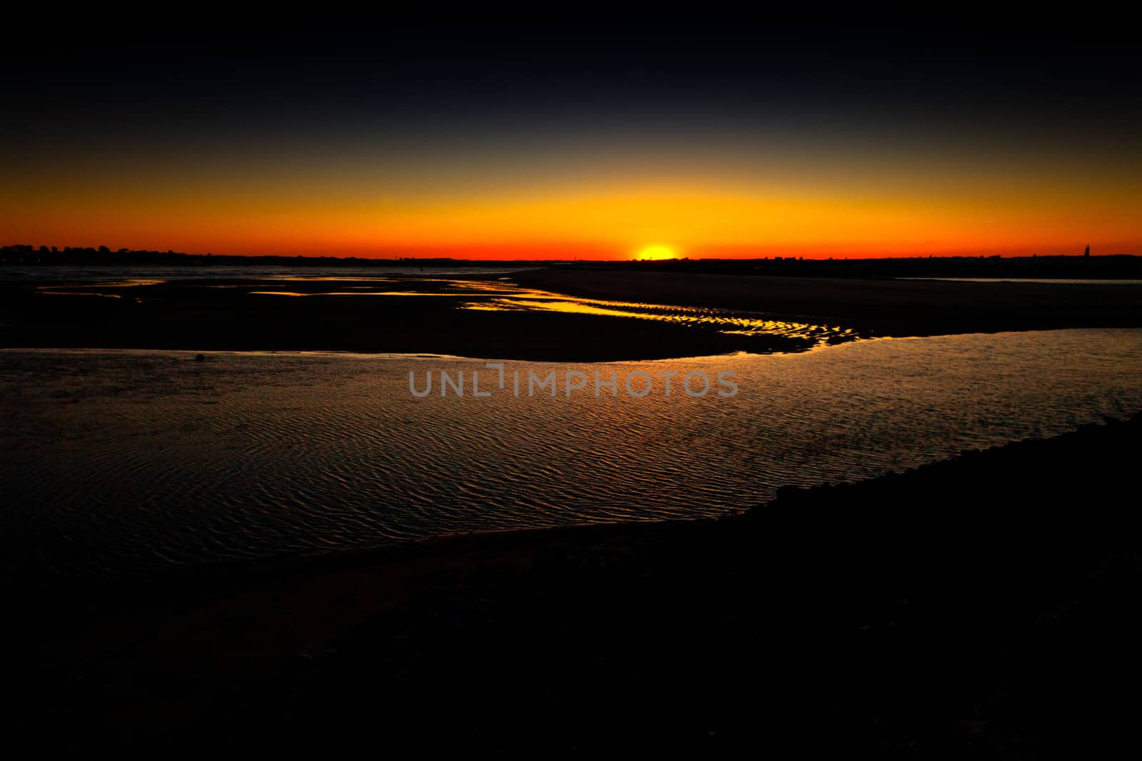 Beautiful summer sunset on the Tejo river.