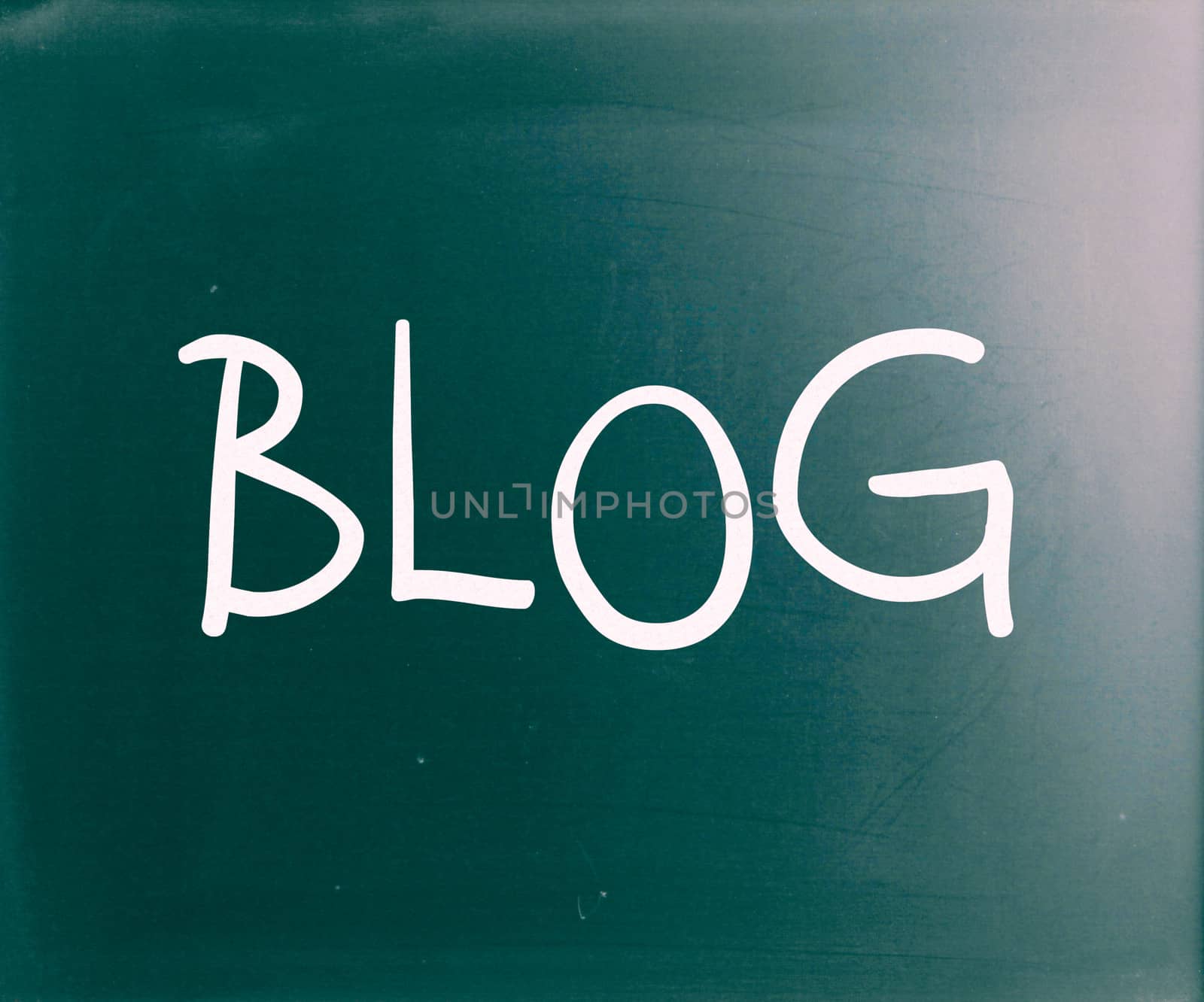 "Blog" handwritten with white chalk on a blackboard