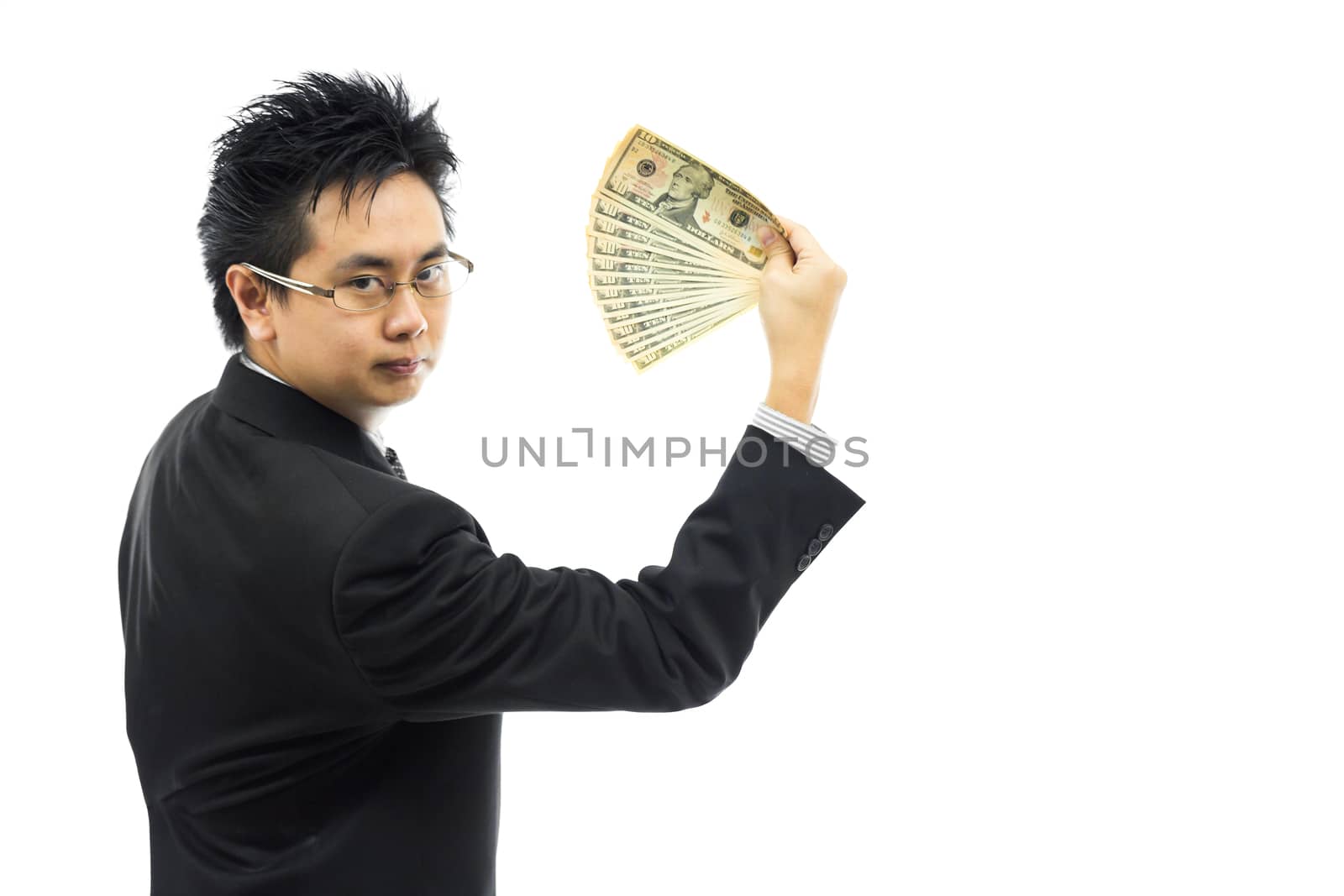 Businessman holding money isolated over white background