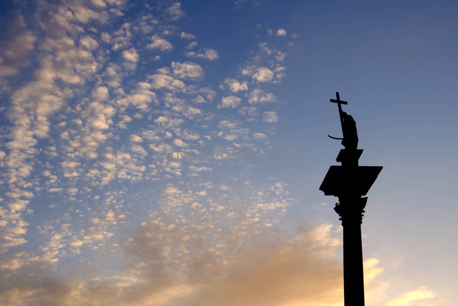 column and statue of King Sigismund III Vasa at sunset, Warsaw, Poland by johnnychaos