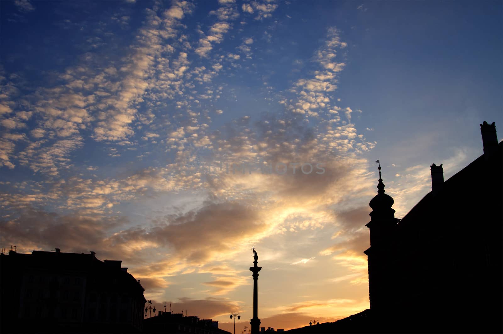 column and statue of King Sigismund III Vasa at sunset, Warsaw, Poland by johnnychaos