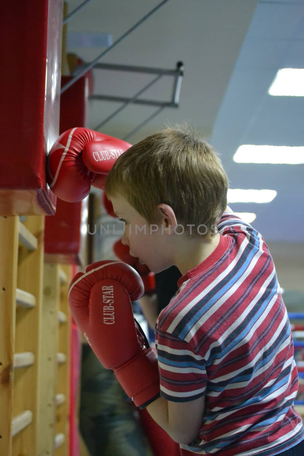The boy at boxing competitions