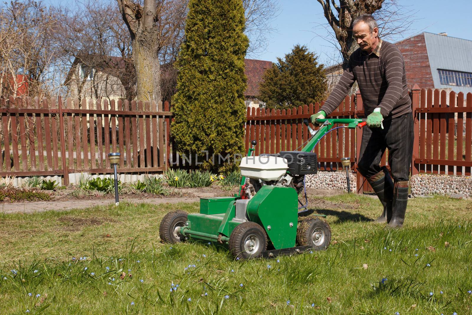 Lawn Aerator.A lawn aerator is a garden tool or machine designed to aerate the soil in which lawn grasses grow