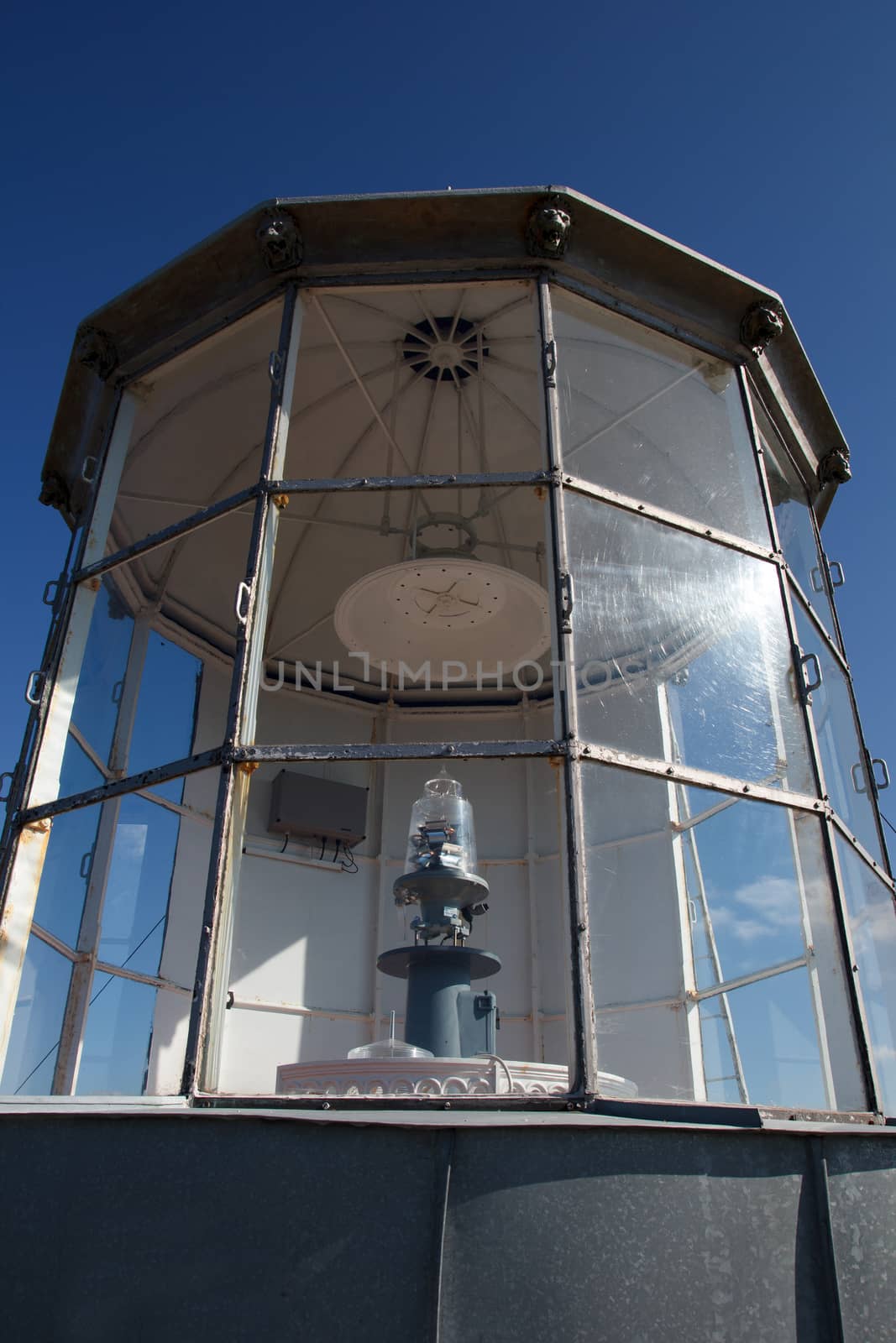 Top of the lighthouse with big light bulb