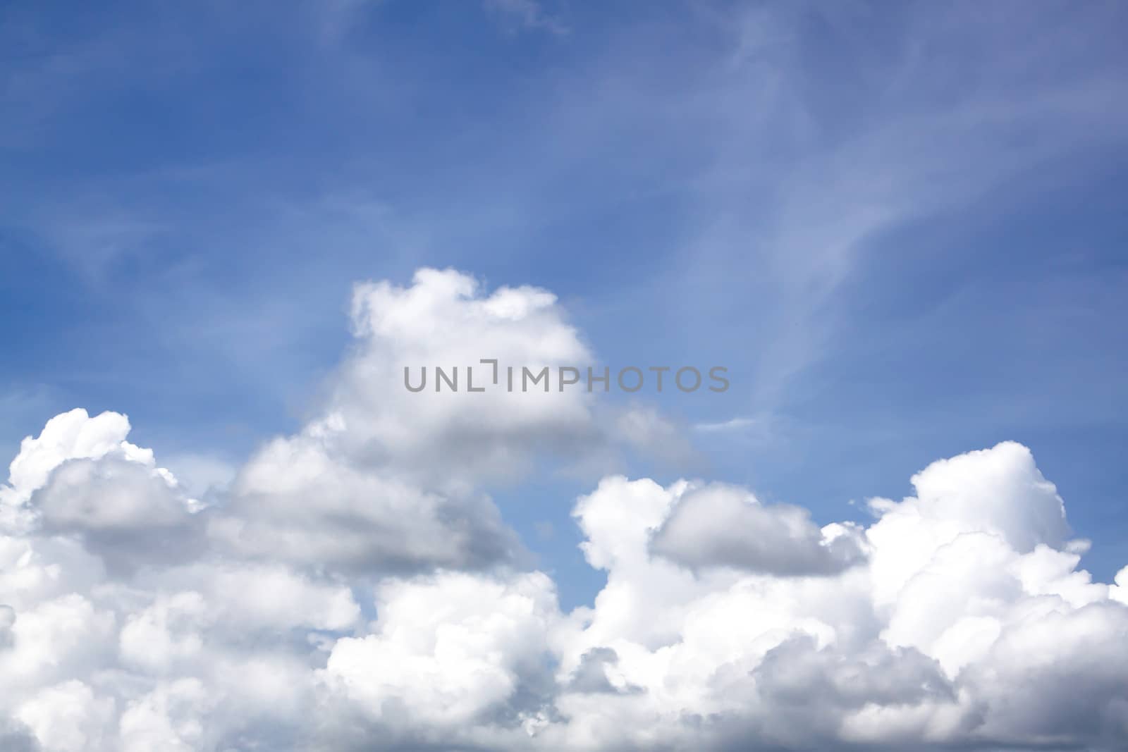 The vast blue sky and clouds sky.