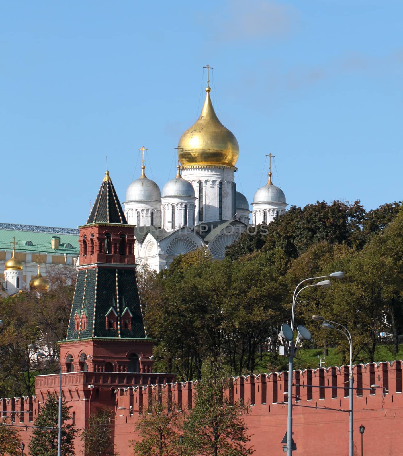 Moscow Kremlin tower on the background of the cathedral