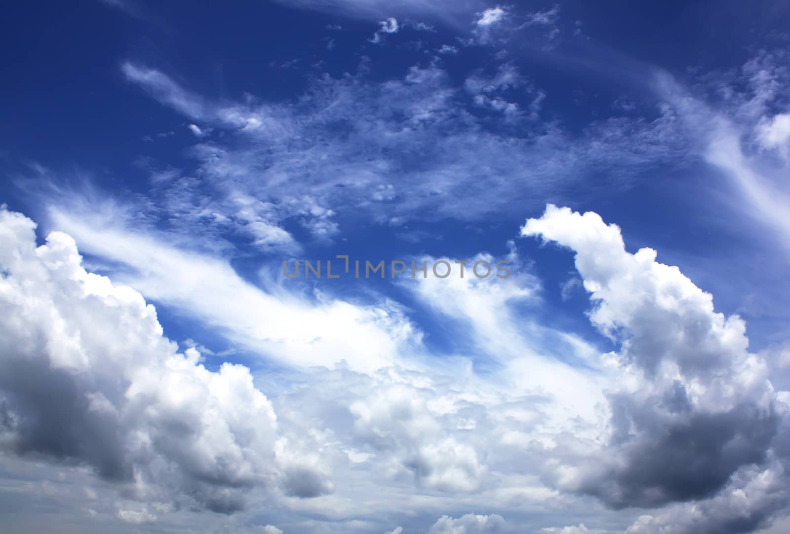 The vast blue sky and clouds sky.