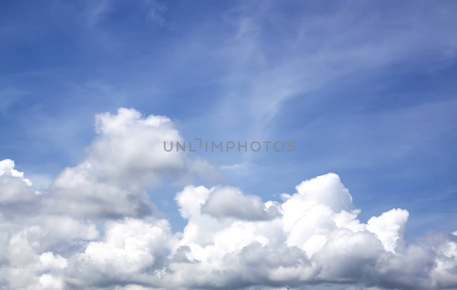 Clear blue sky with cloud close up