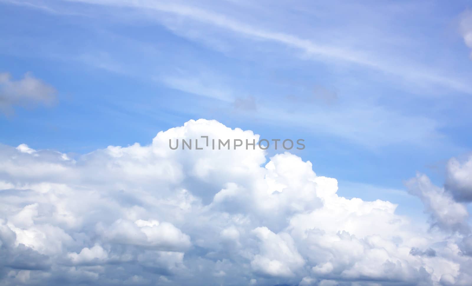 The vast blue sky and clouds sky.