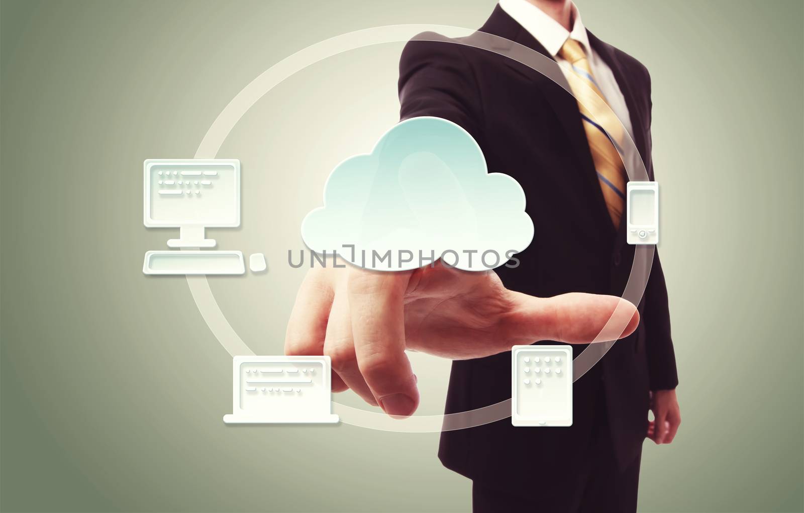 Businessman pressing cloud icon with devices over vintage green background