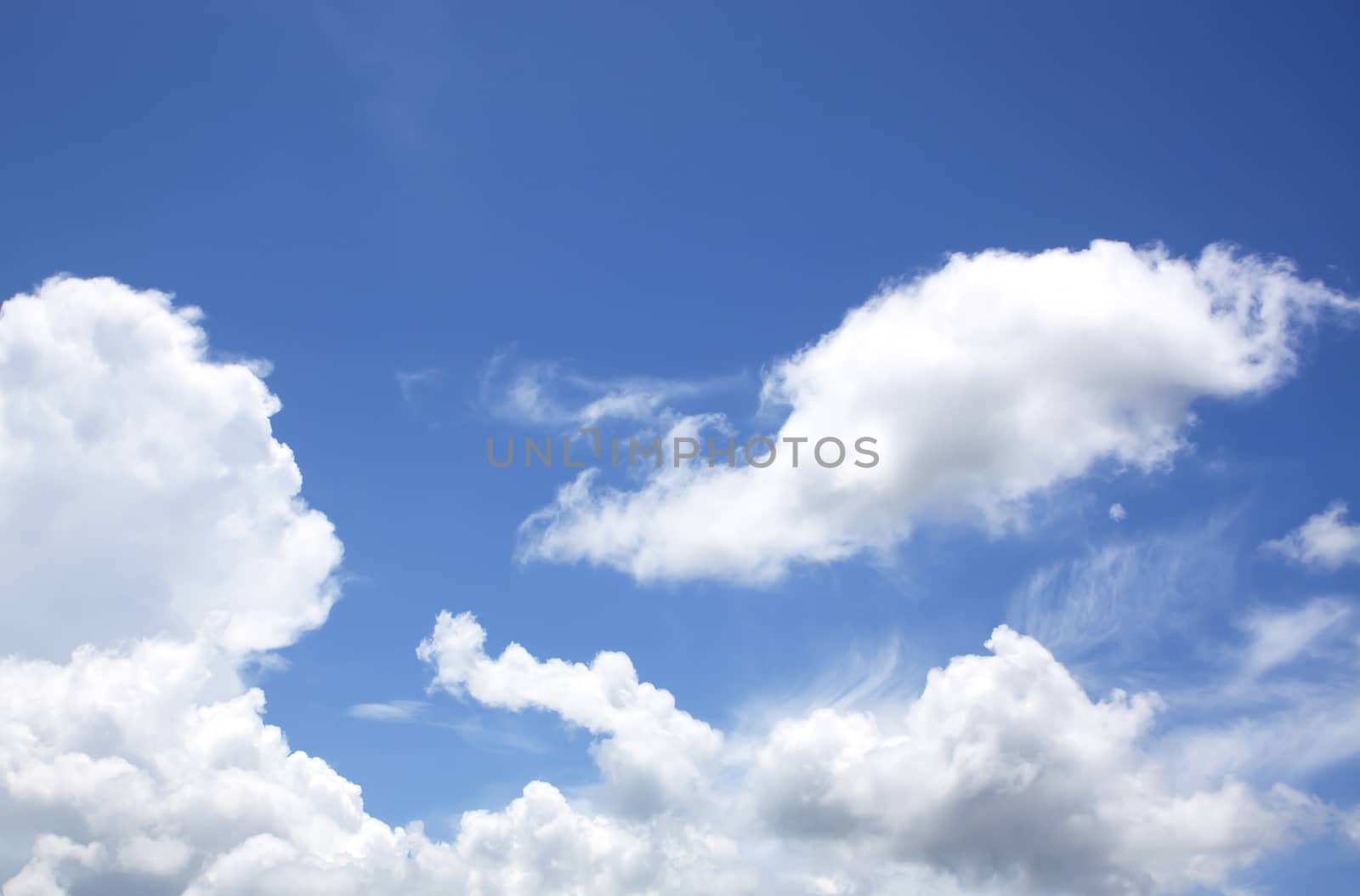 The vast blue sky and clouds sky.