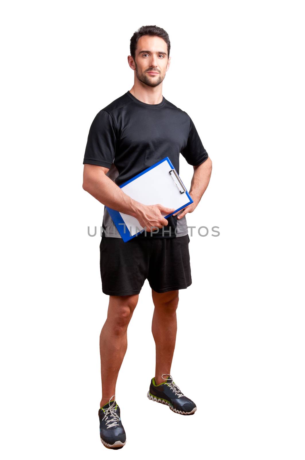 Personal Trainer, with a pad in his hand, isolated in white