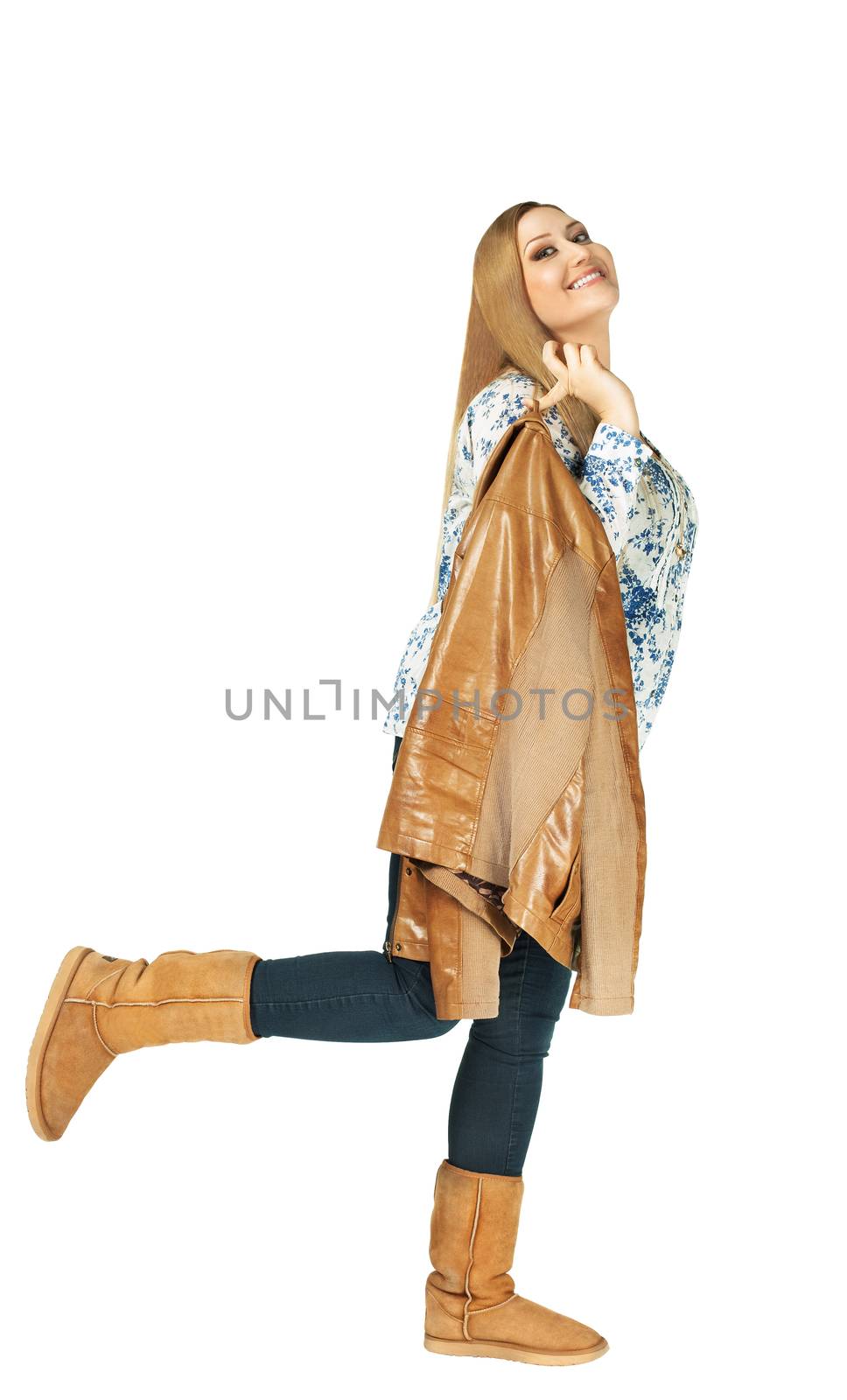 Charming xxl woman smiling and holding a jacket on white background