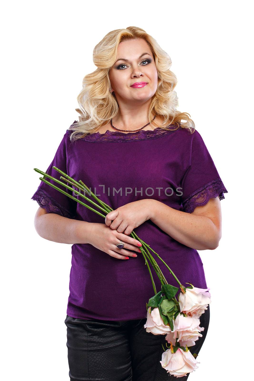 Blonde lady with a bouquet of flowers in her blouse shot in studio