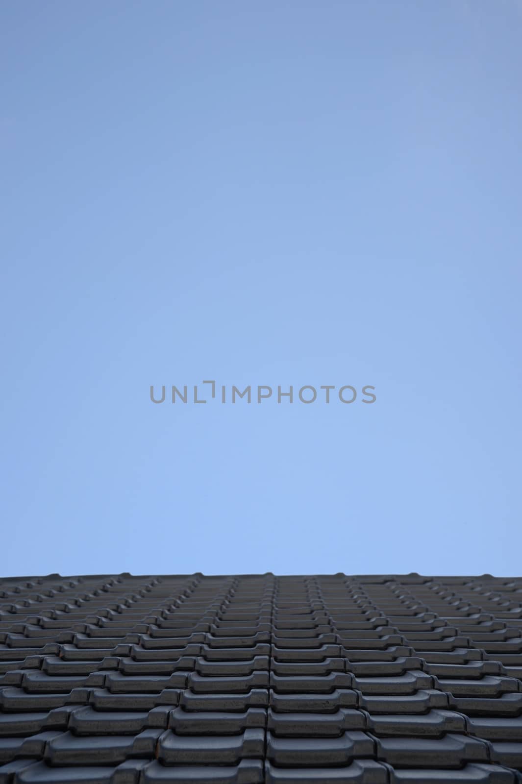 A close up shot a tiled roof