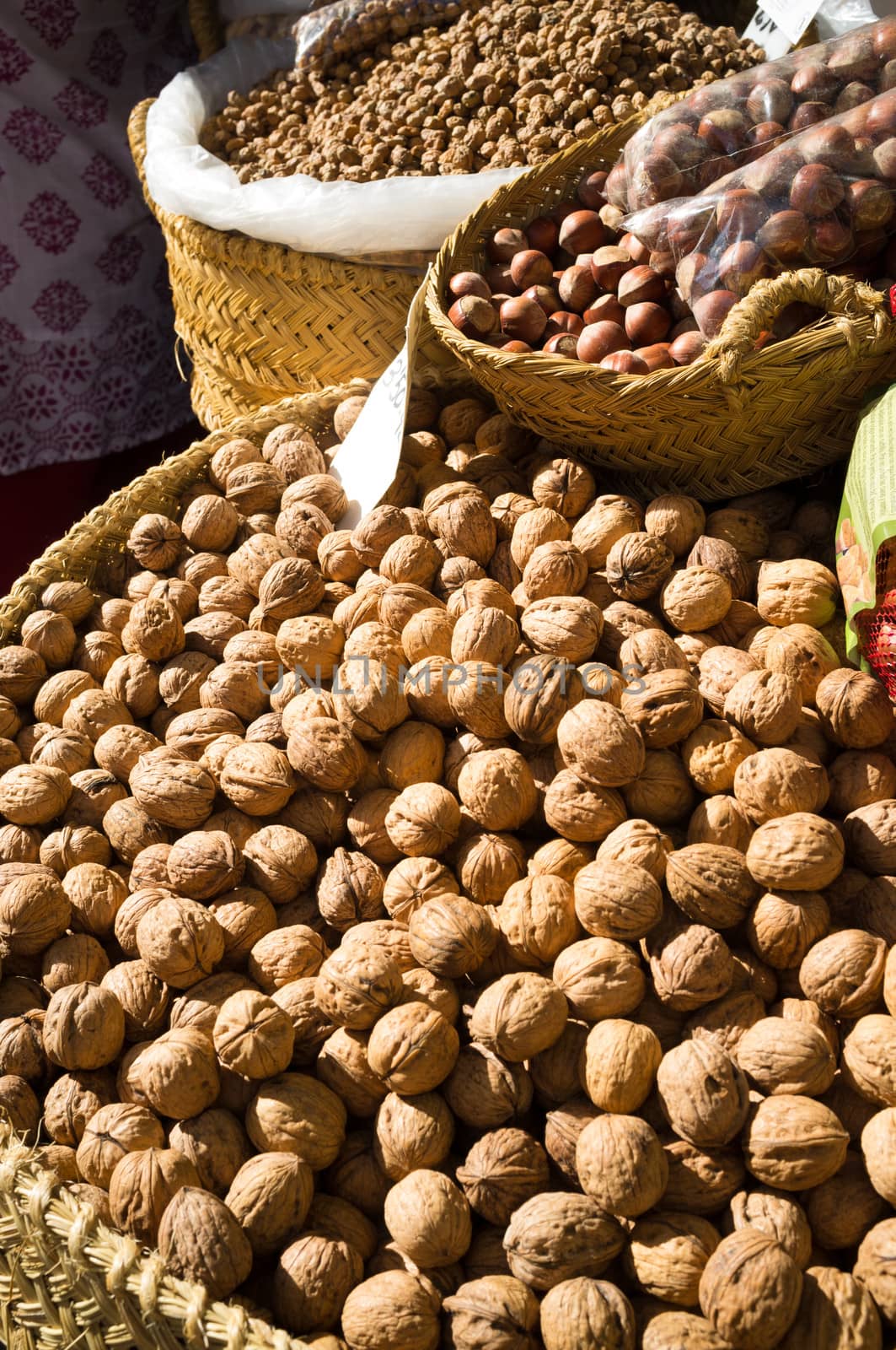 Nuts on a market stall by hemeroskopion