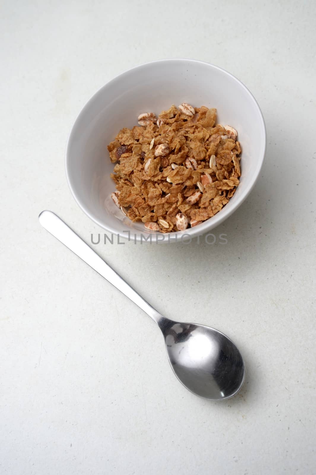 Breakfast ceral in a bowl on a kitchen bench