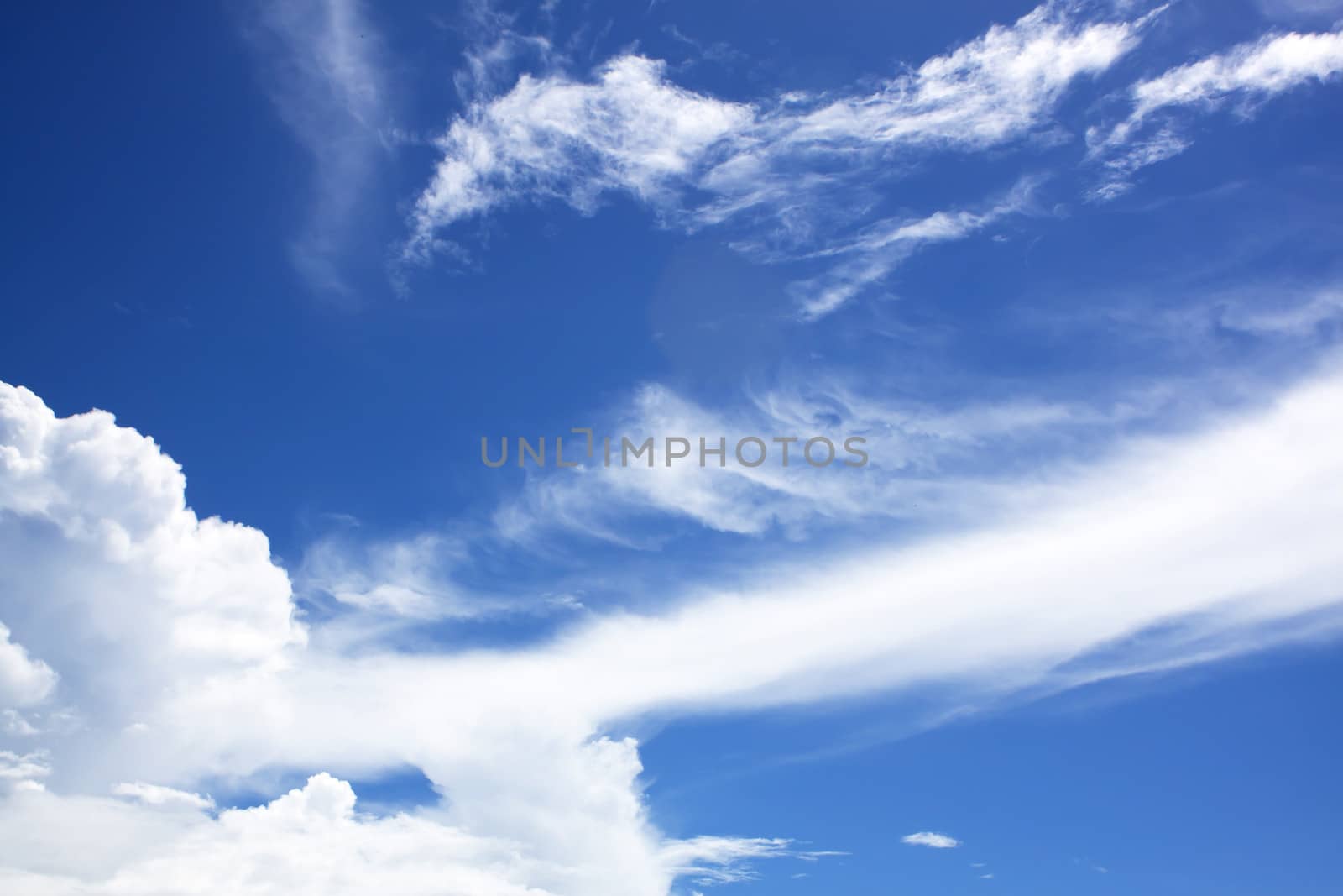 Blue Sky Background With White Clouds by janniwet