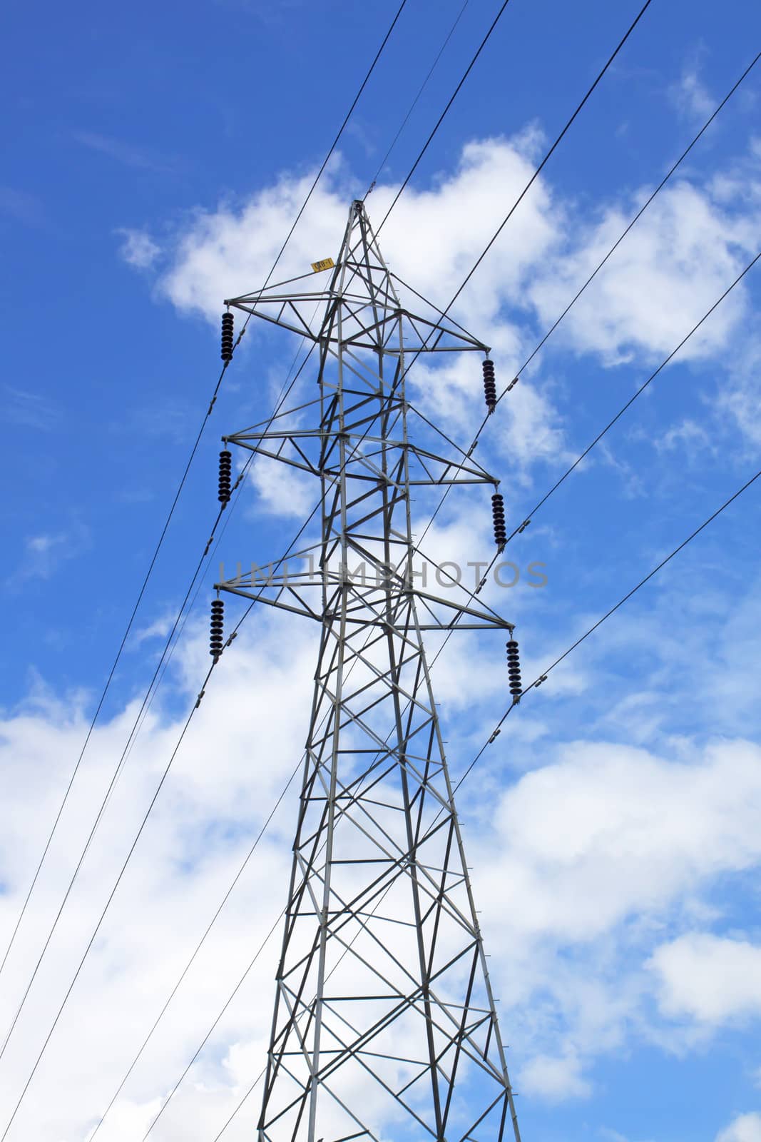 high voltage post.High-voltage tower sky background.