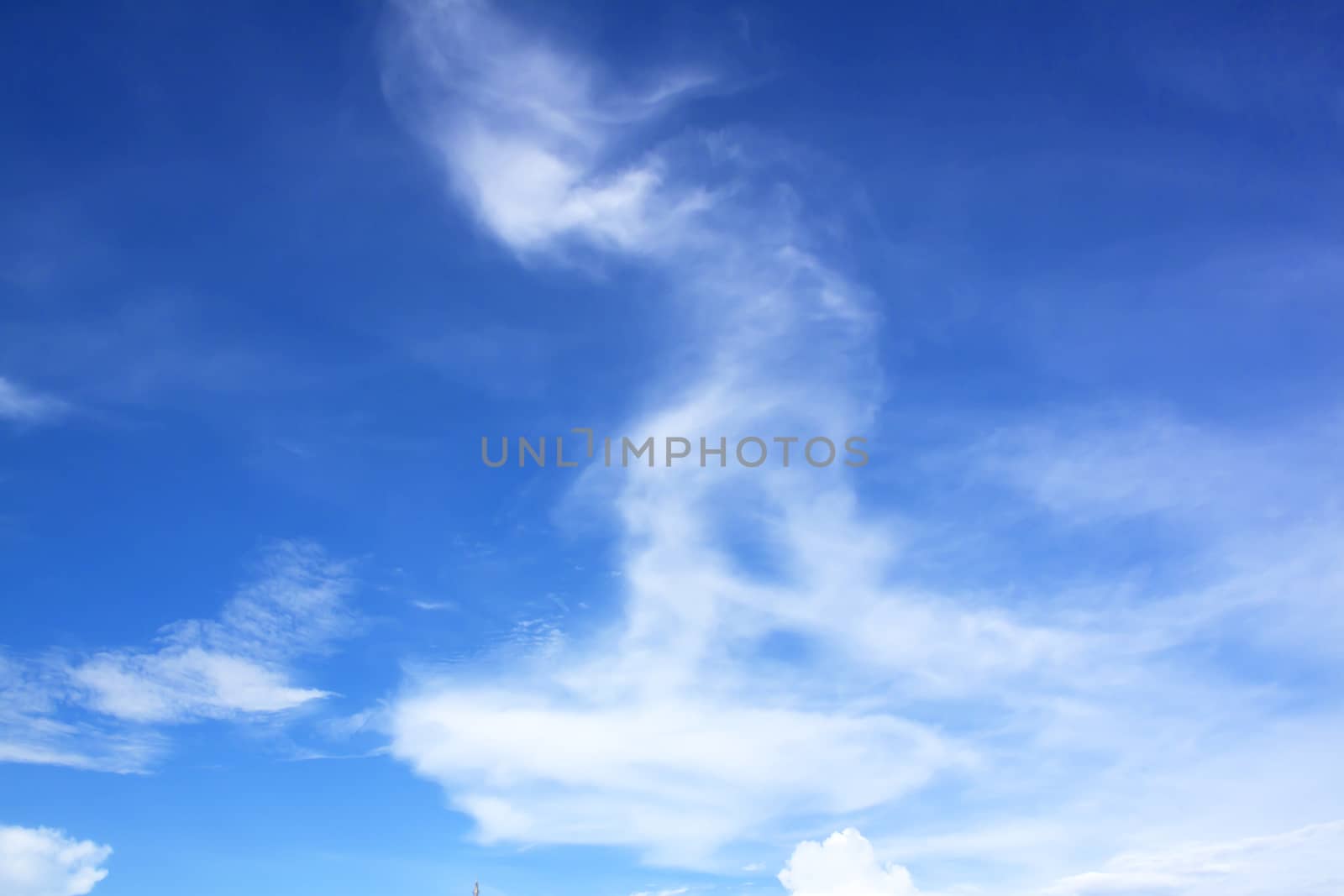 White fluffy clouds in the blue sky