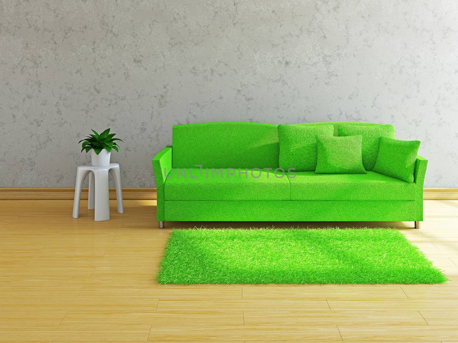 Green sofa with pillows near the concrete wall