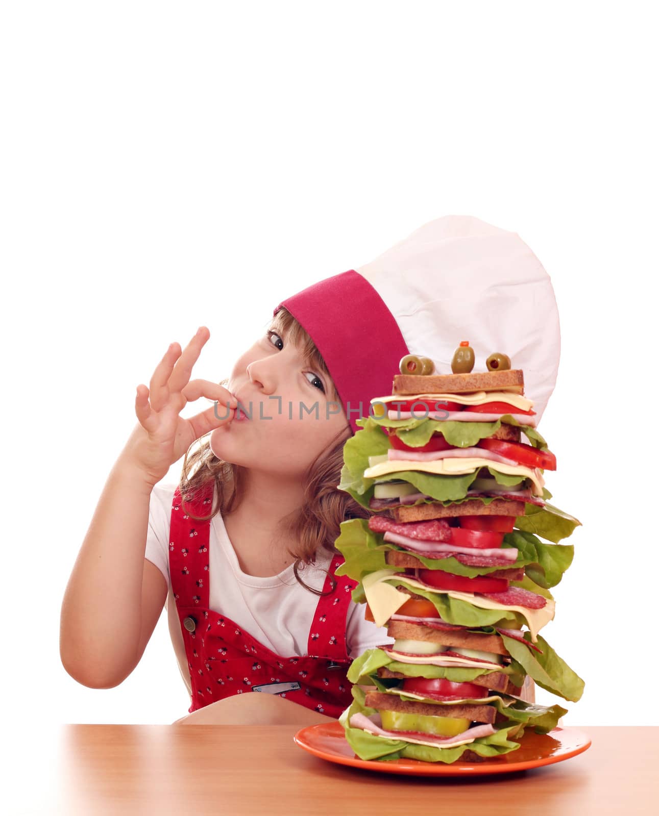 little girl with ok hand sign and tall sandwich by goce