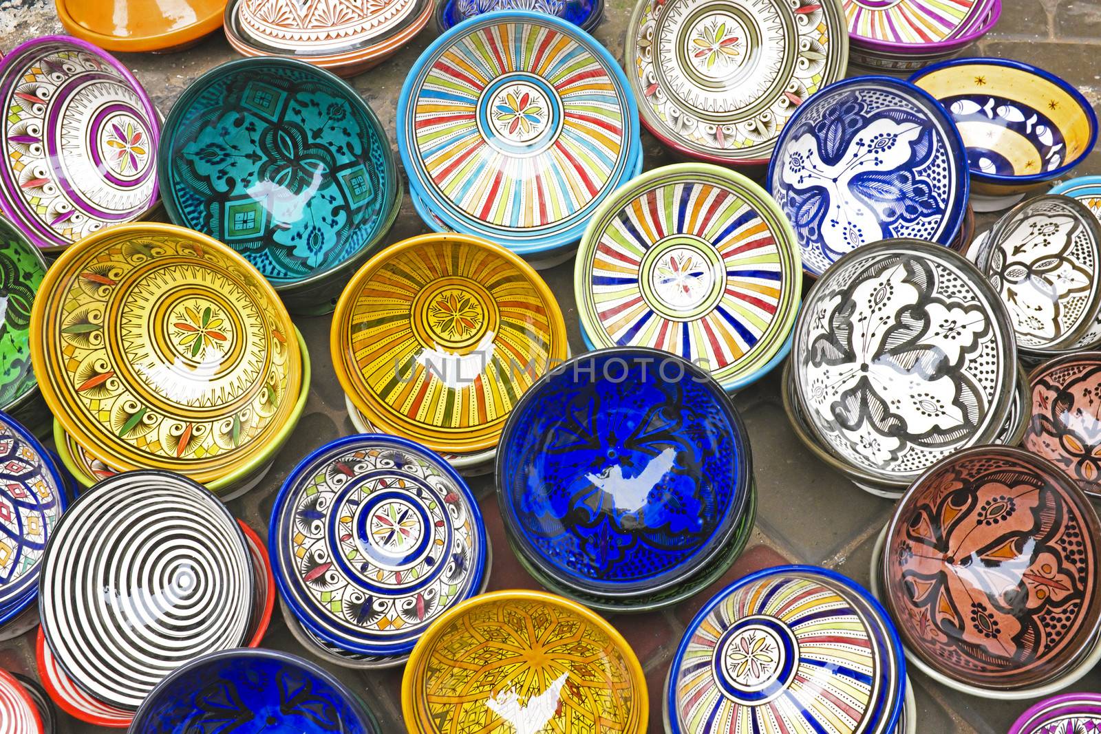Colorful Tajines for sale in a market stall