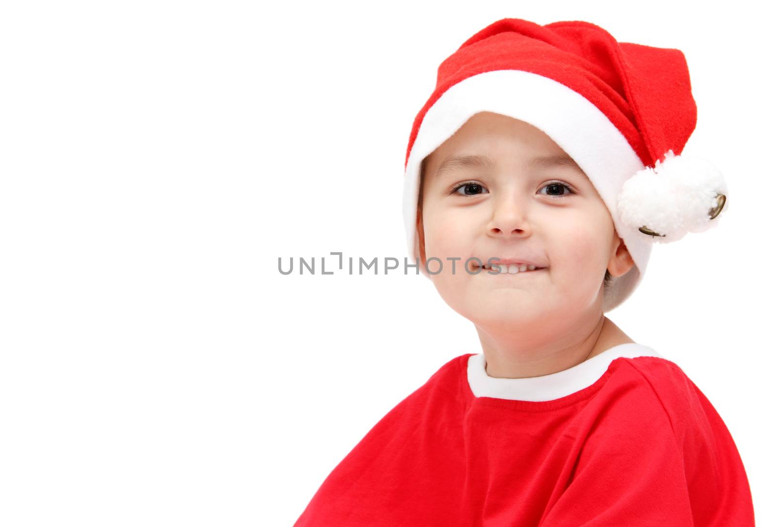 child in santa claus hat by NikolayK
