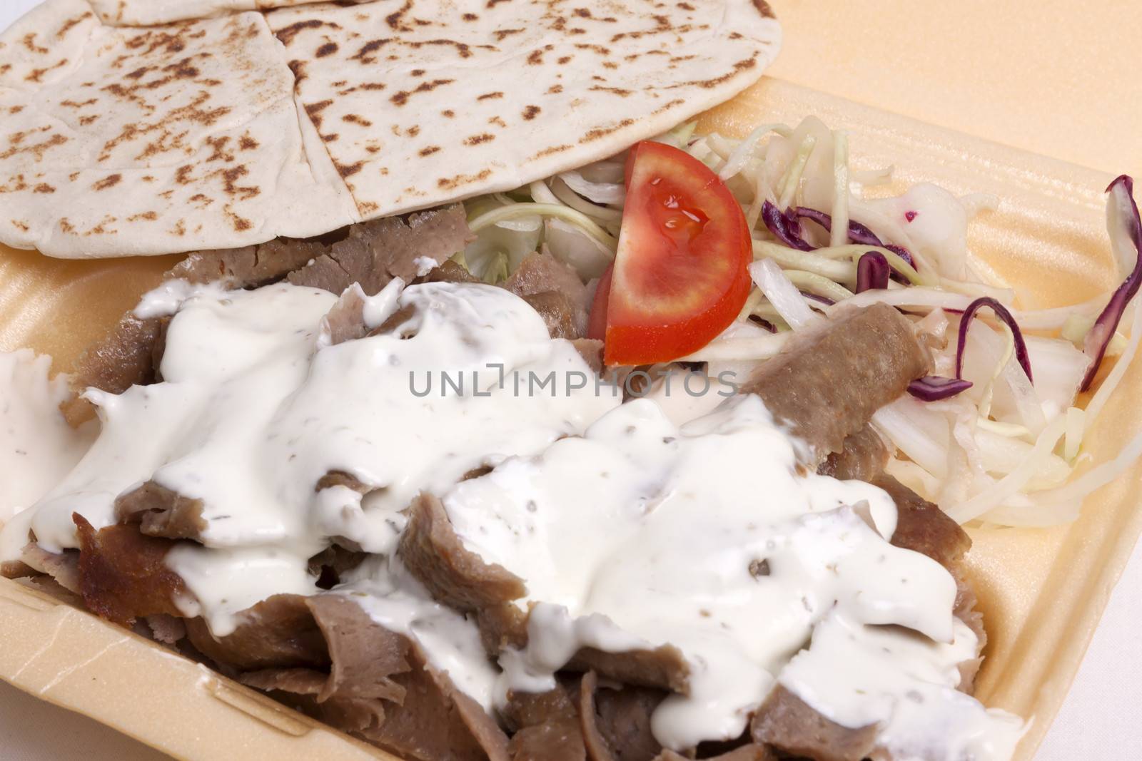 Take away doner kebab isolated on white