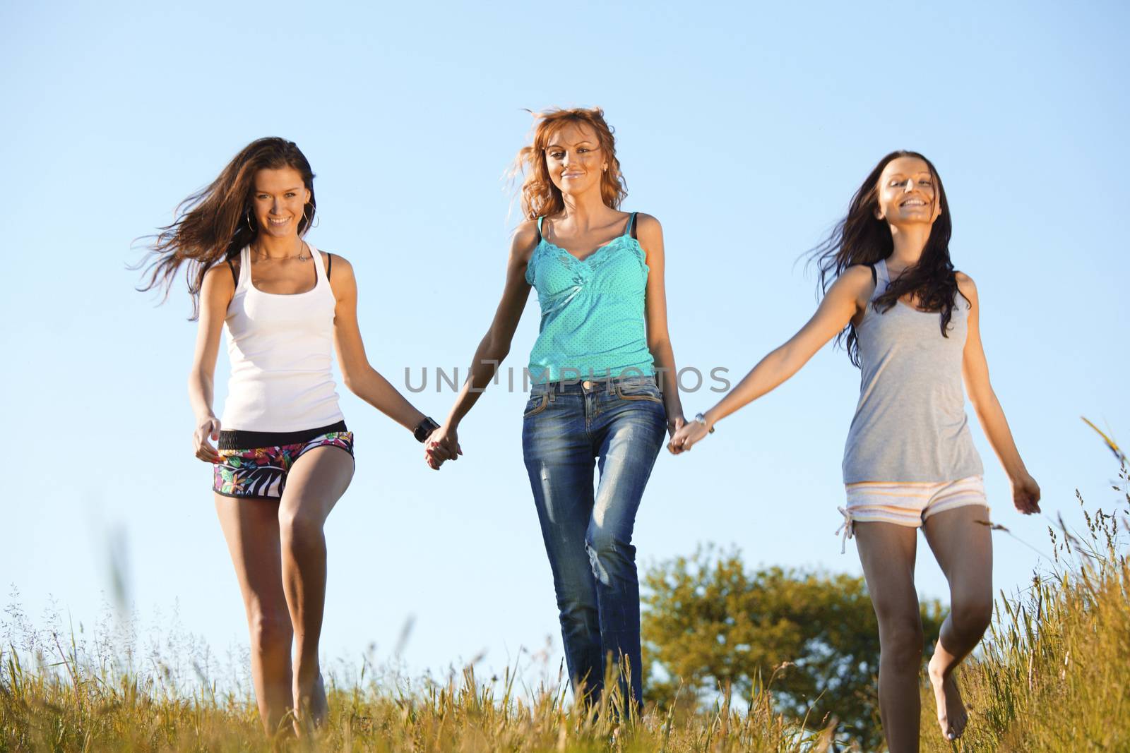 women fun on grass field