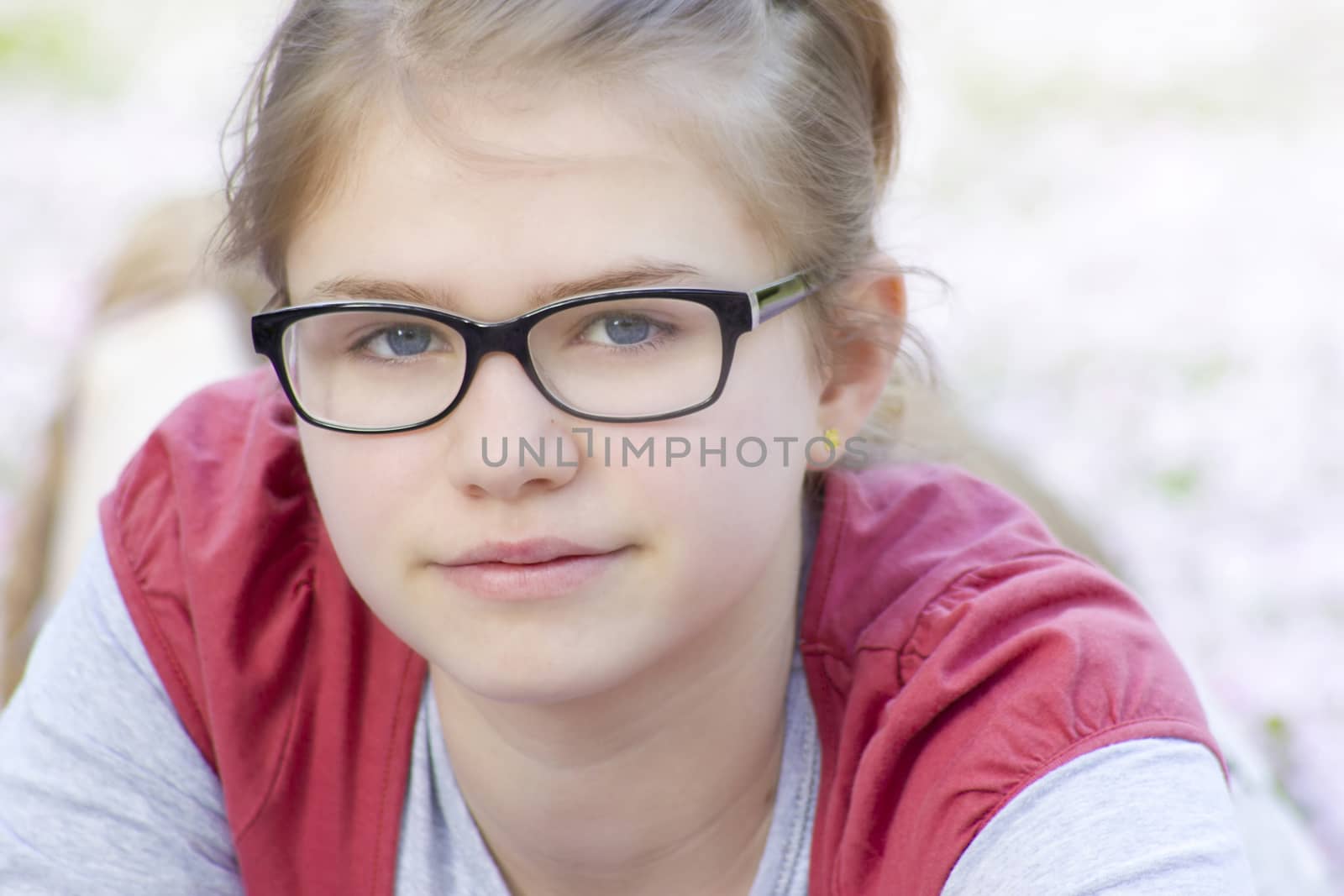 portrait of young girl with glasses by miradrozdowski