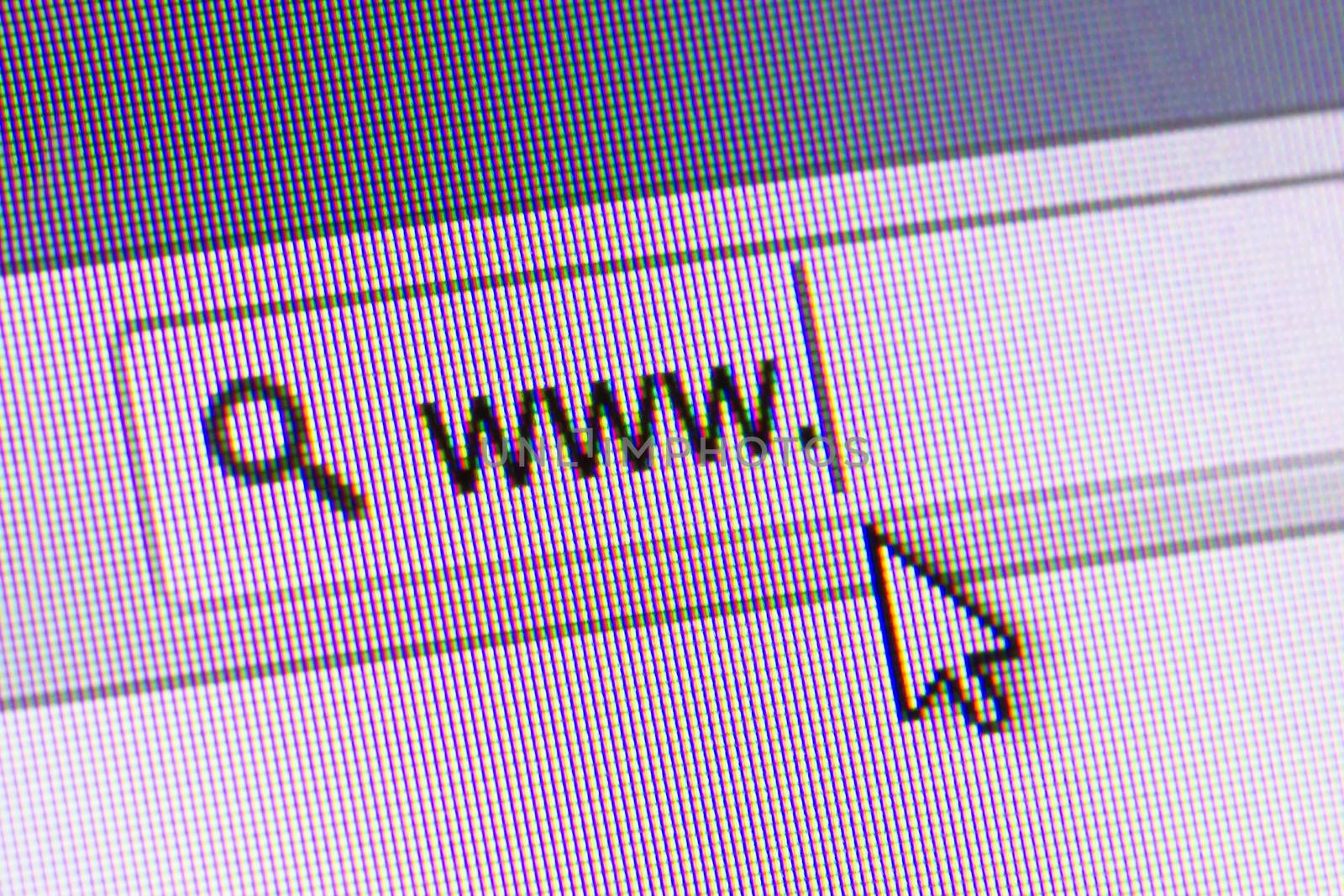 Mouse arrow pointing internet browser address bar with www text, close up of computer screen.