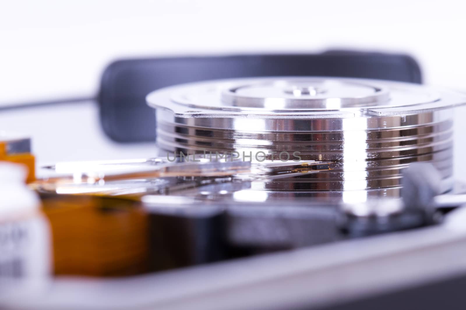 Close up of opened hard disk drive.