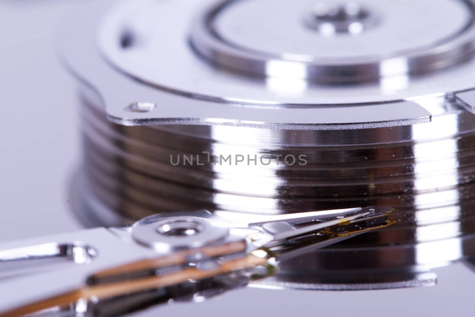 Close up of opened hard disk drive.