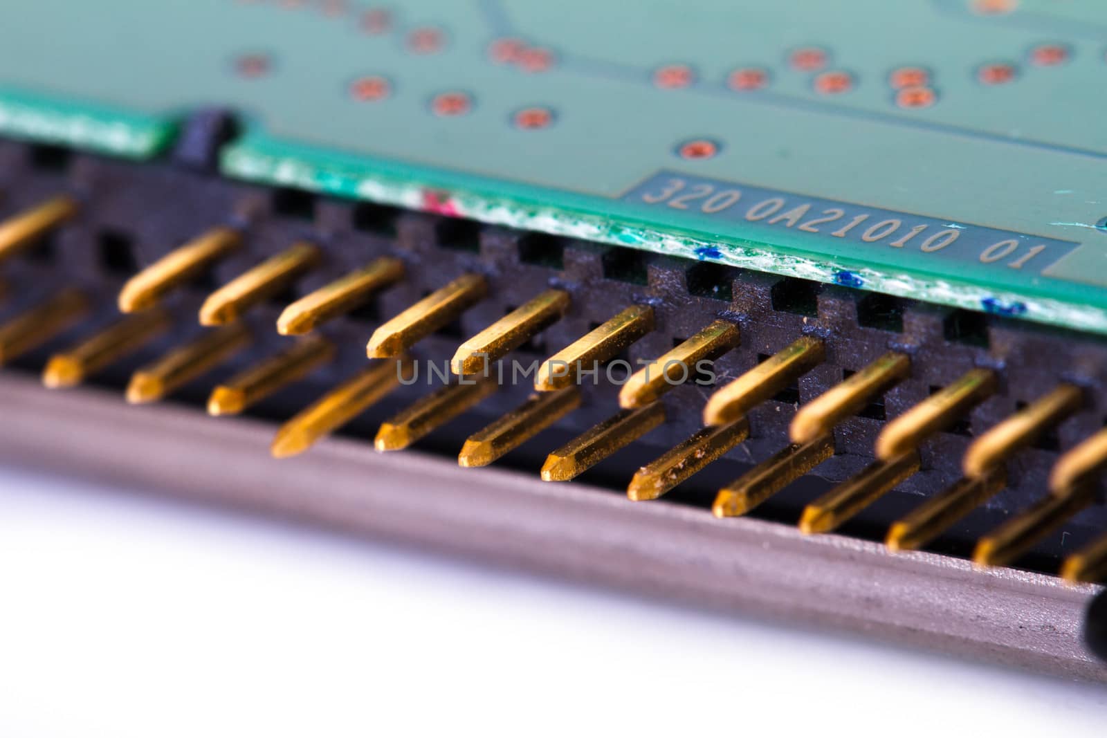Pins of hard disk drive, isolated on white background.