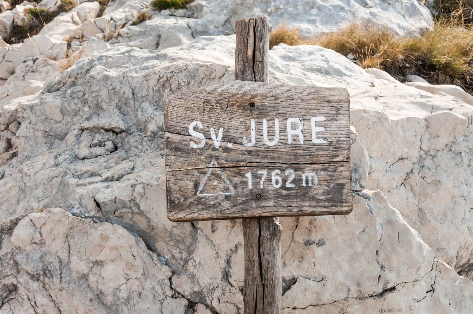 Sv. Jure peak sign in Biokovo mountains, Croatia.