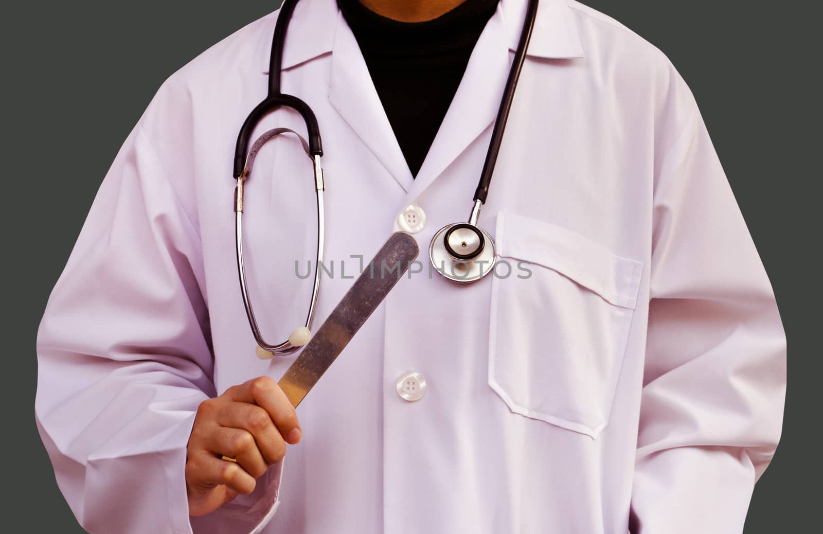 Medical Doctor with a stethoscope in hospital. (Medical Concept)