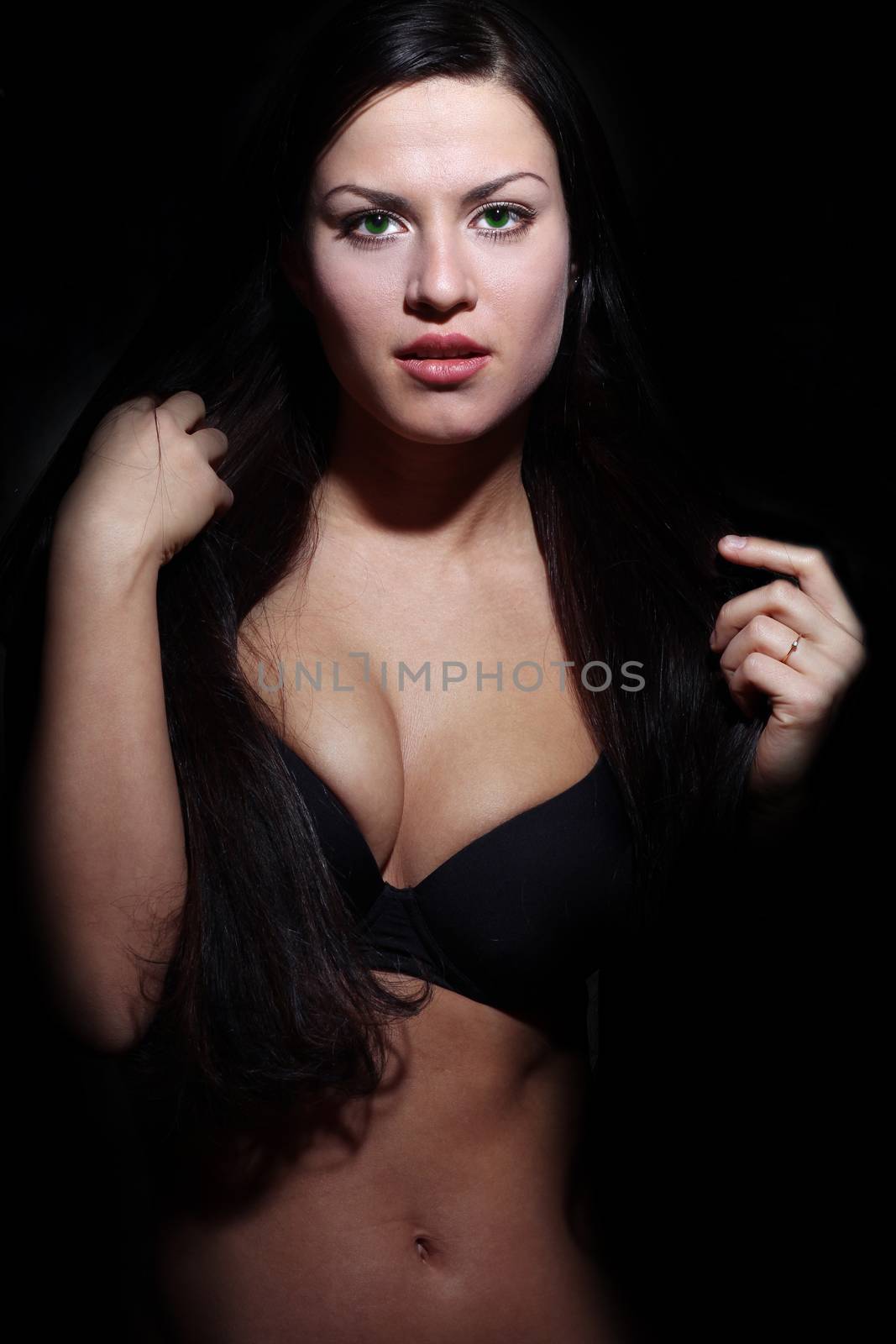 Sexy young woman, body on young female in soft light
