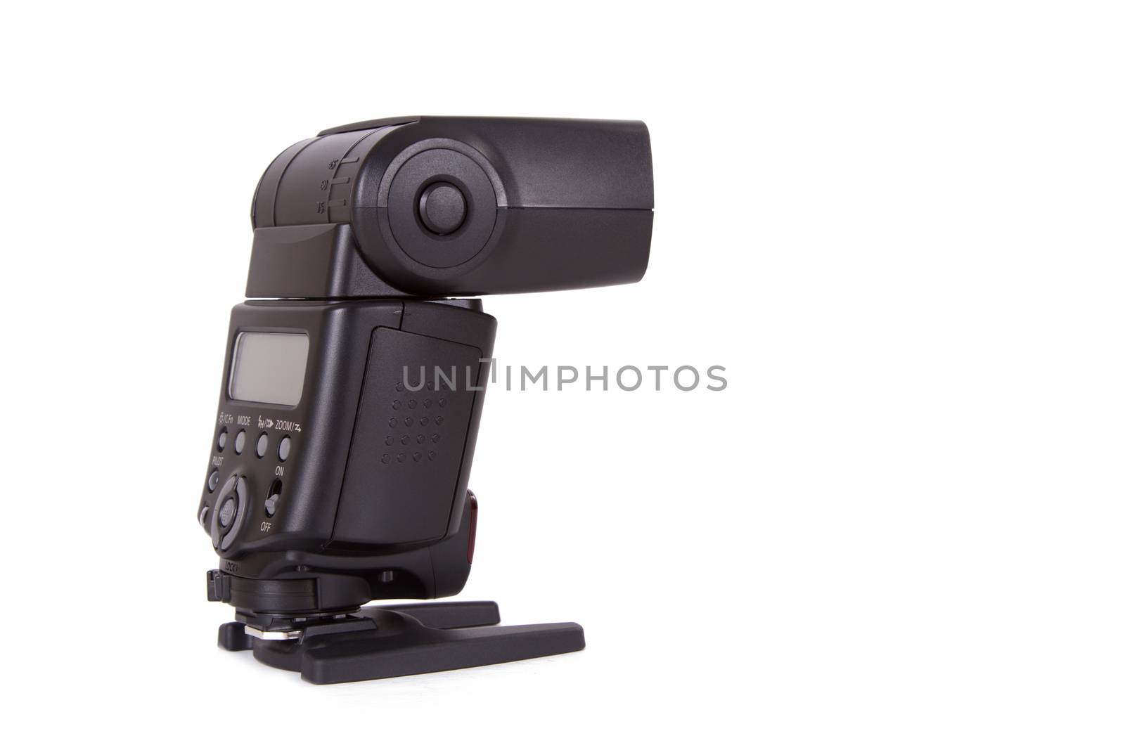 Electronic external speedlight, back view, isolated on white background.