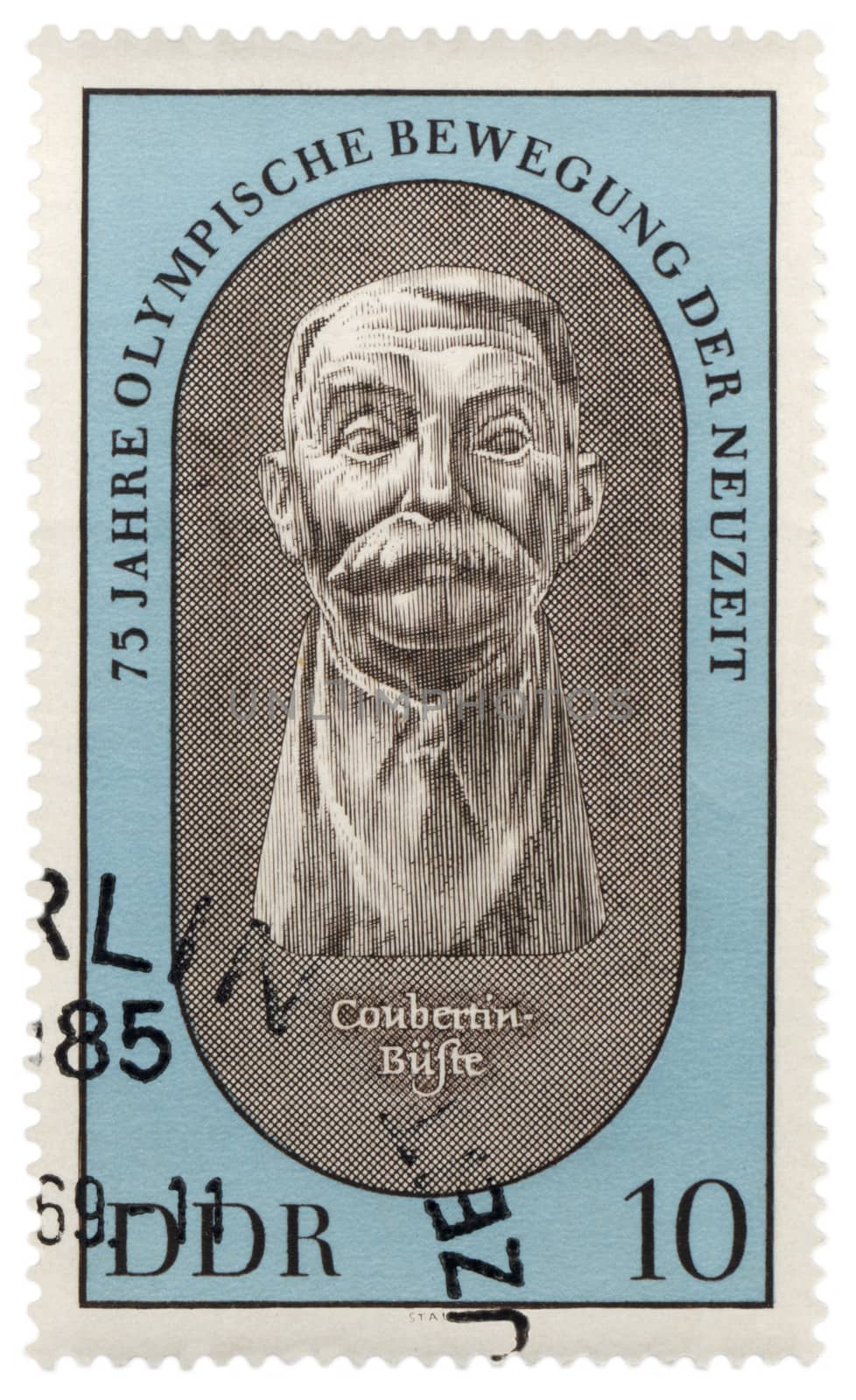 Relief of Pierre de Coubertin on postage stamp by wander