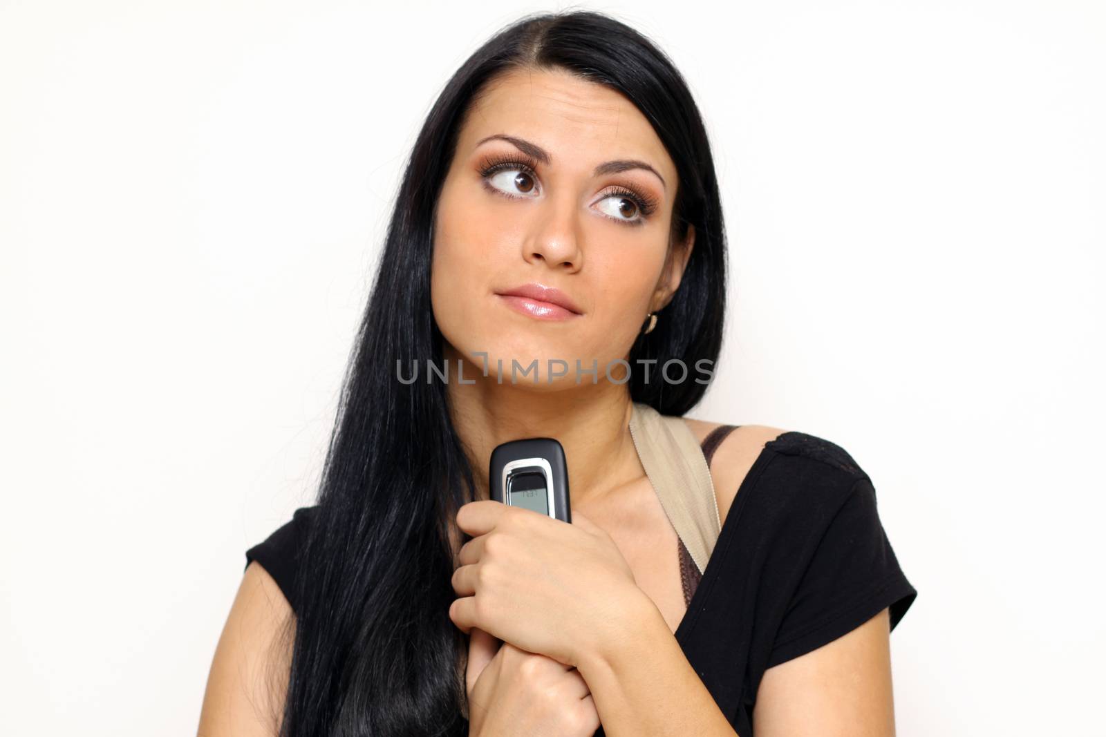 Young beautiful woman talking on cell phone
